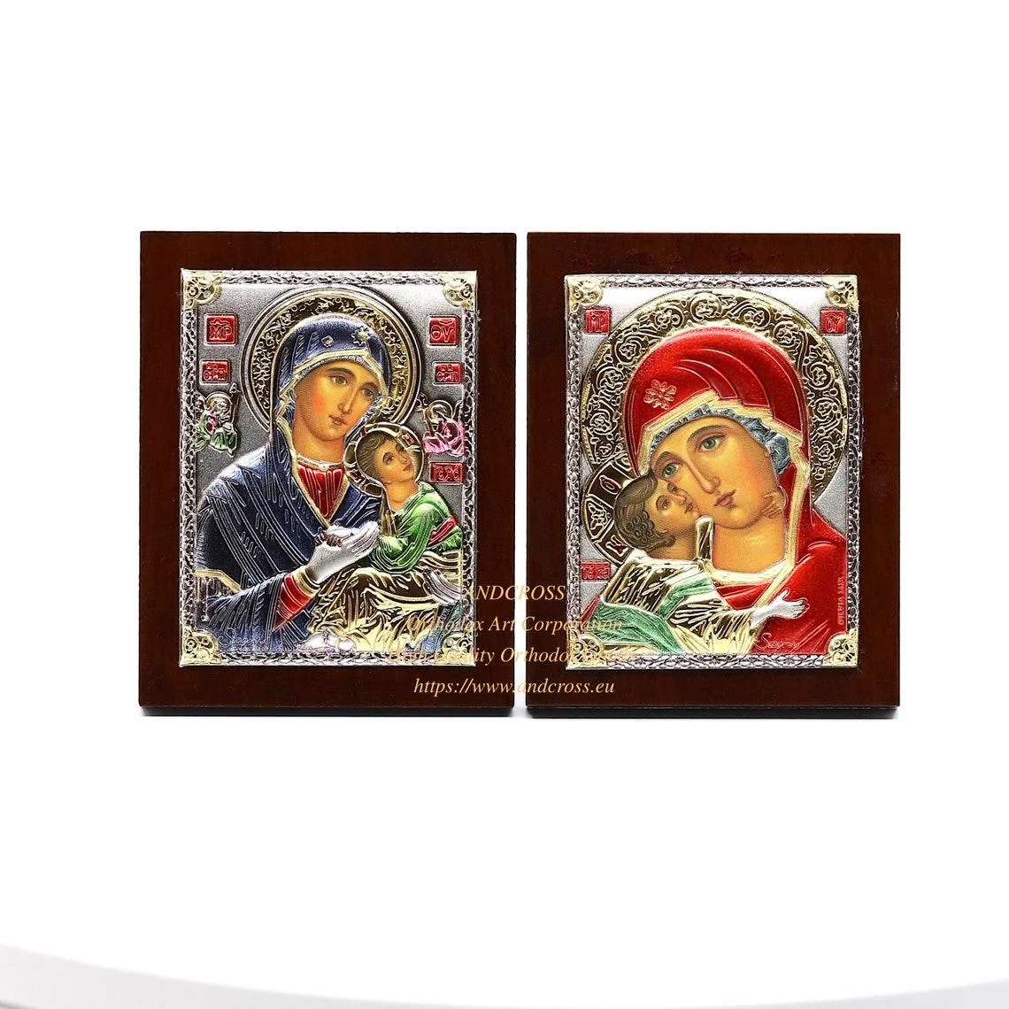 Two small silver-plated icons: the Amolyntos and the Vladimir Mother of God