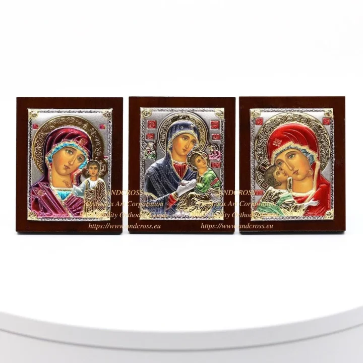 Three small silver-plated Mother of God icons: Amolyntos, Kazan and Vladimir