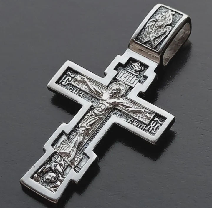 Sterling silver baptism cross with the Crucifixion