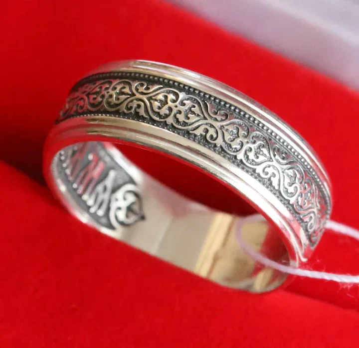 Sterling silver Byzantine prayer ring with a floral ornament