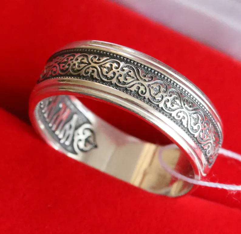 Sterling silver Byzantine prayer ring with a floral ornament
