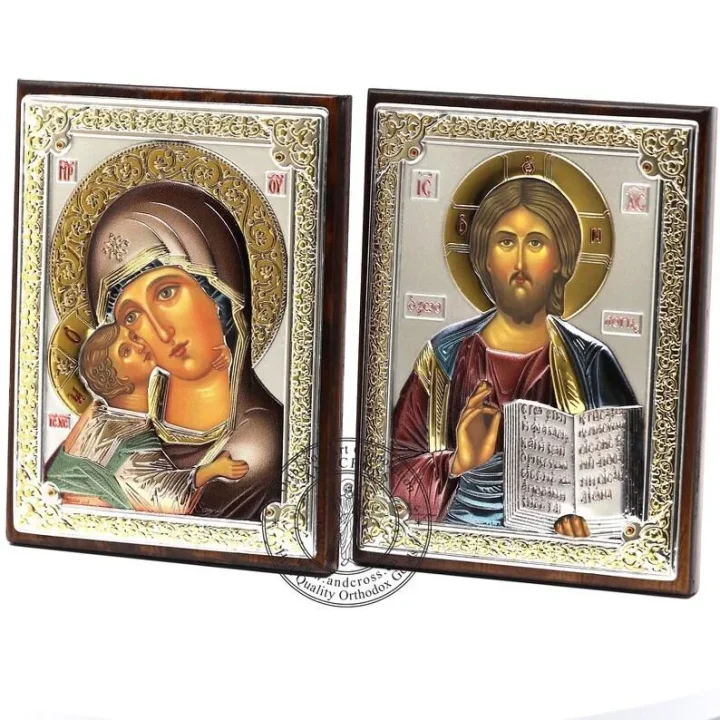 Two silver-plated icons, Christ Pantocrator and the Vladimir Mother of God, 8 x 11 cm