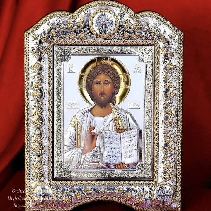 Christ Pantocrator icon in a silver- and gold-plated cover, in a glass frame