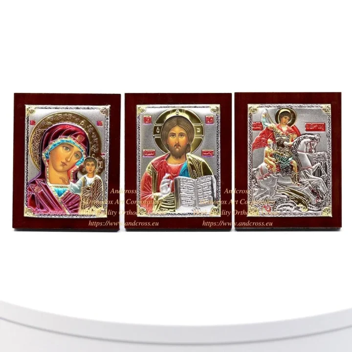 Three small silver-plated icons: Christ Pantocrator, Kazan Mother of God and St George