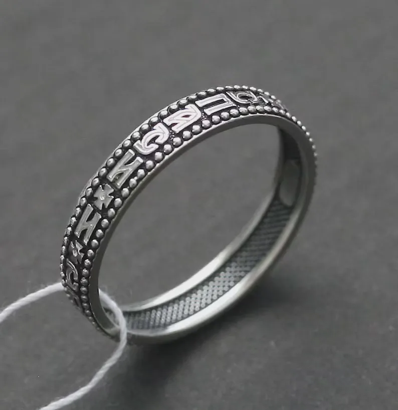 Delicate handcrafted sterling silver Save and Protect ring