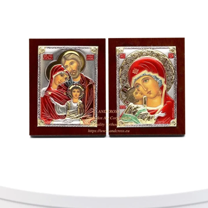 Two small silver-plated icons: the Holy Family and the Vladimir Mother of God