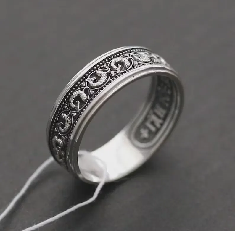 Sterling silver ring with a holy fish symbol and the Jesus Prayer inside