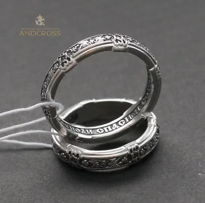 Thin sterling silver ring with a dove and ornament