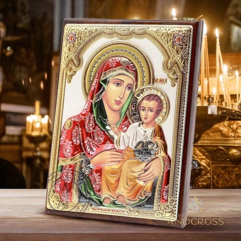 Silver-plated Jerusalem Mother of God icon on a wooden base