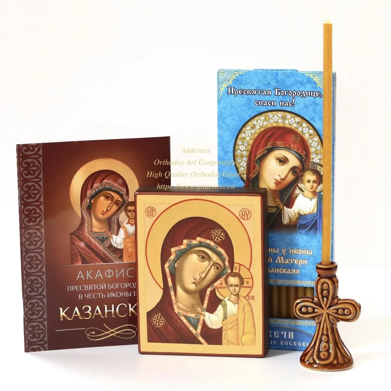 Kazan Mother of God icon set with candles and a ceramic holder