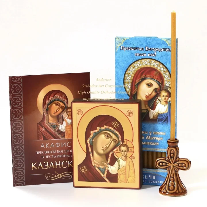Kazan Mother of God icon set with candles and a ceramic holder