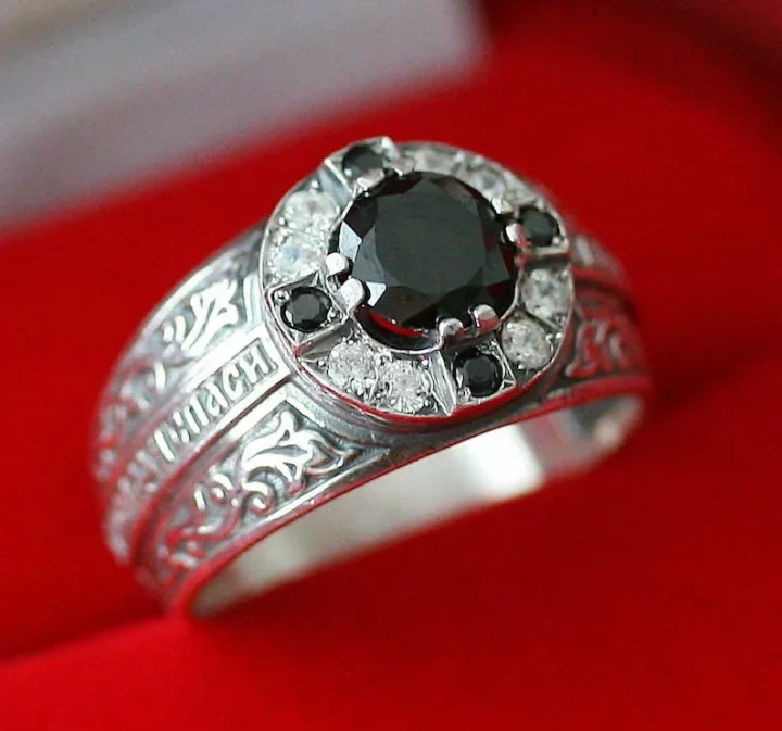 Men's sterling silver ring with a black centre stone and white stones