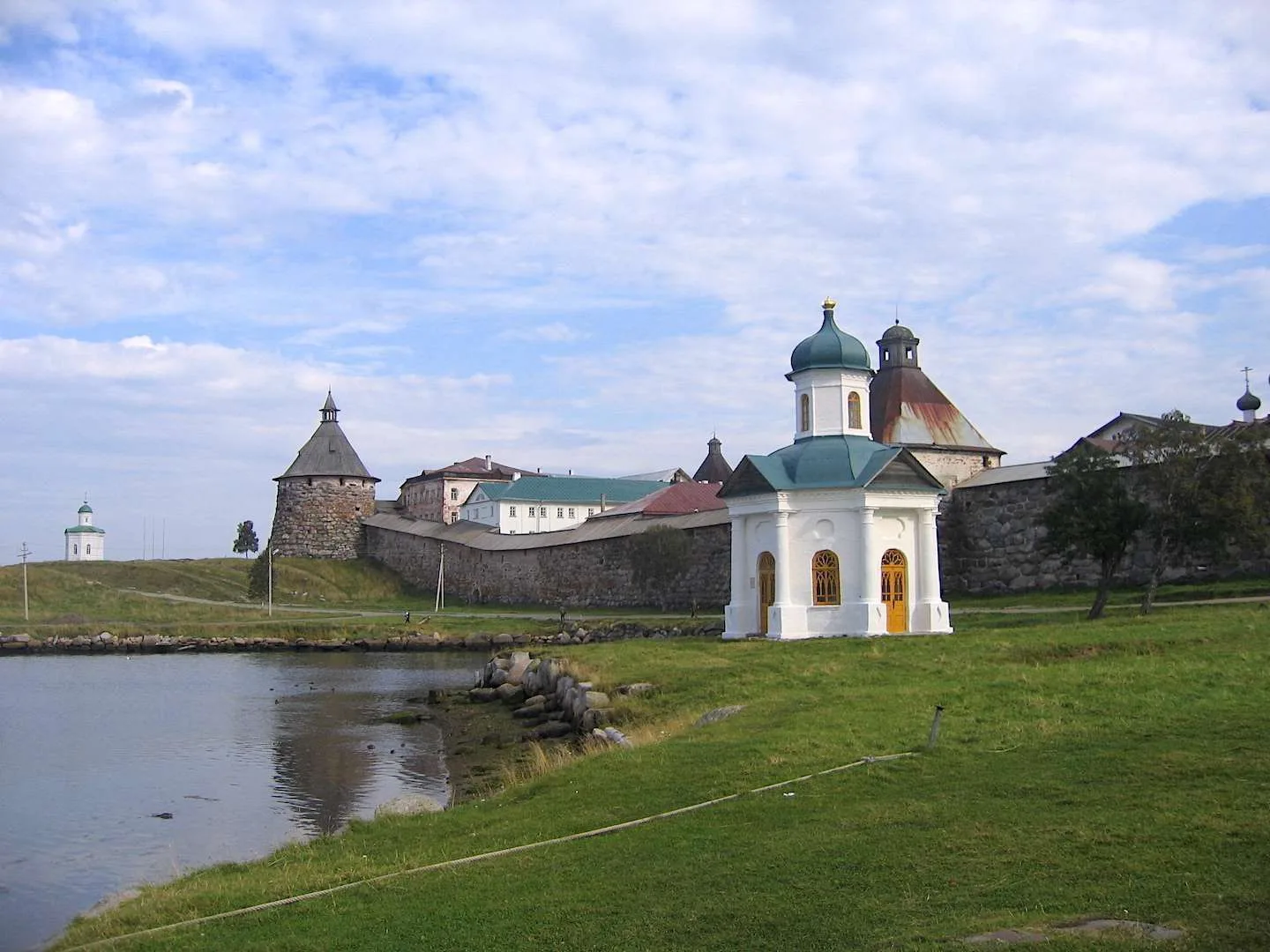 The monastery walls from the shore, 2009