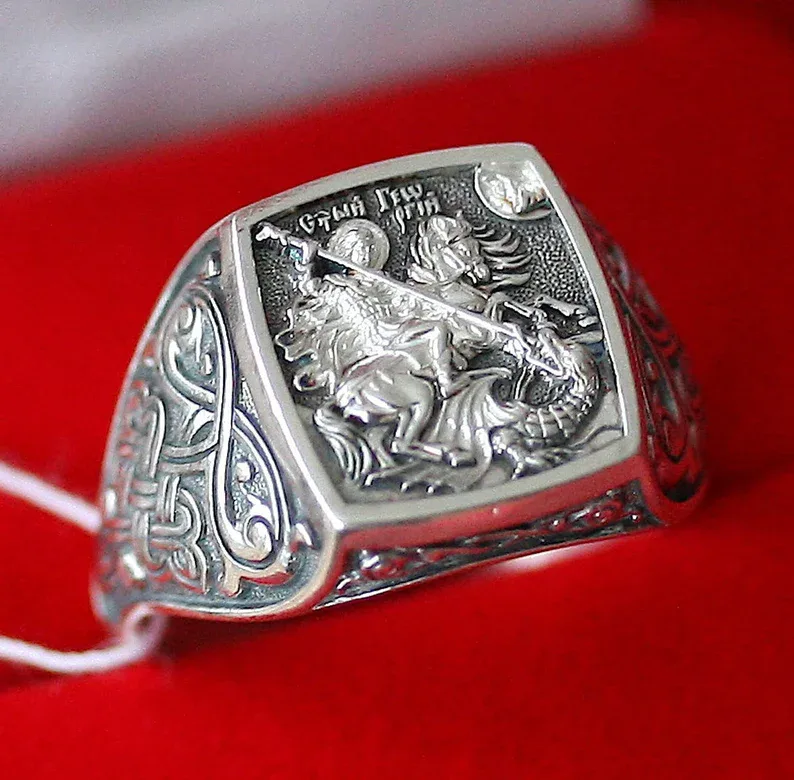 Sterling silver ring with St George slaying the dragon