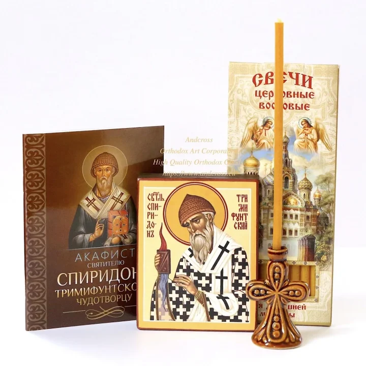 St Spyridon icon set with candles and a ceramic holder