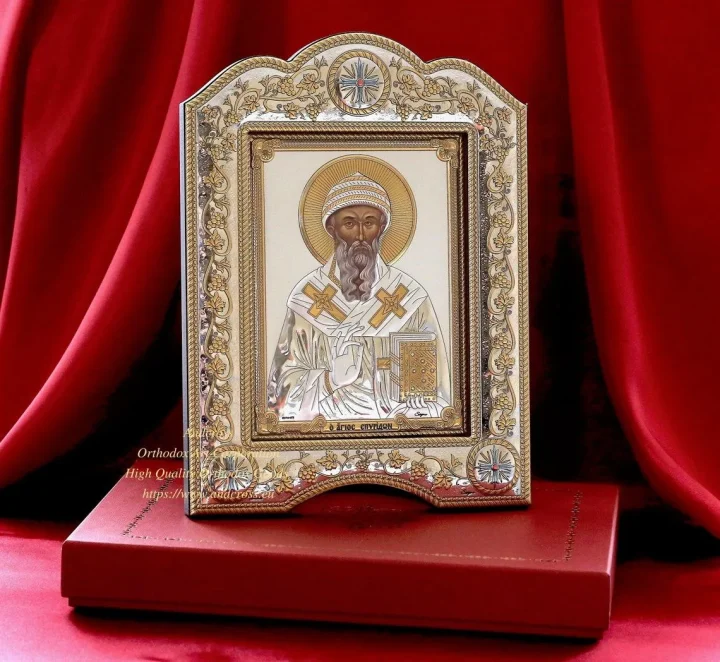 St Spyridon icon in a silver- and gold-plated cover, framed under glass, 21 x 28 cm