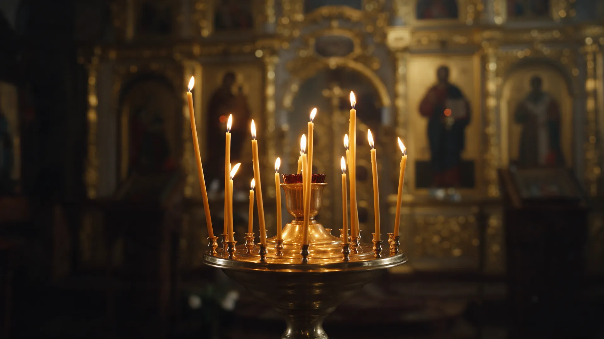 Candles before the iconostasis in an Orthodox church
